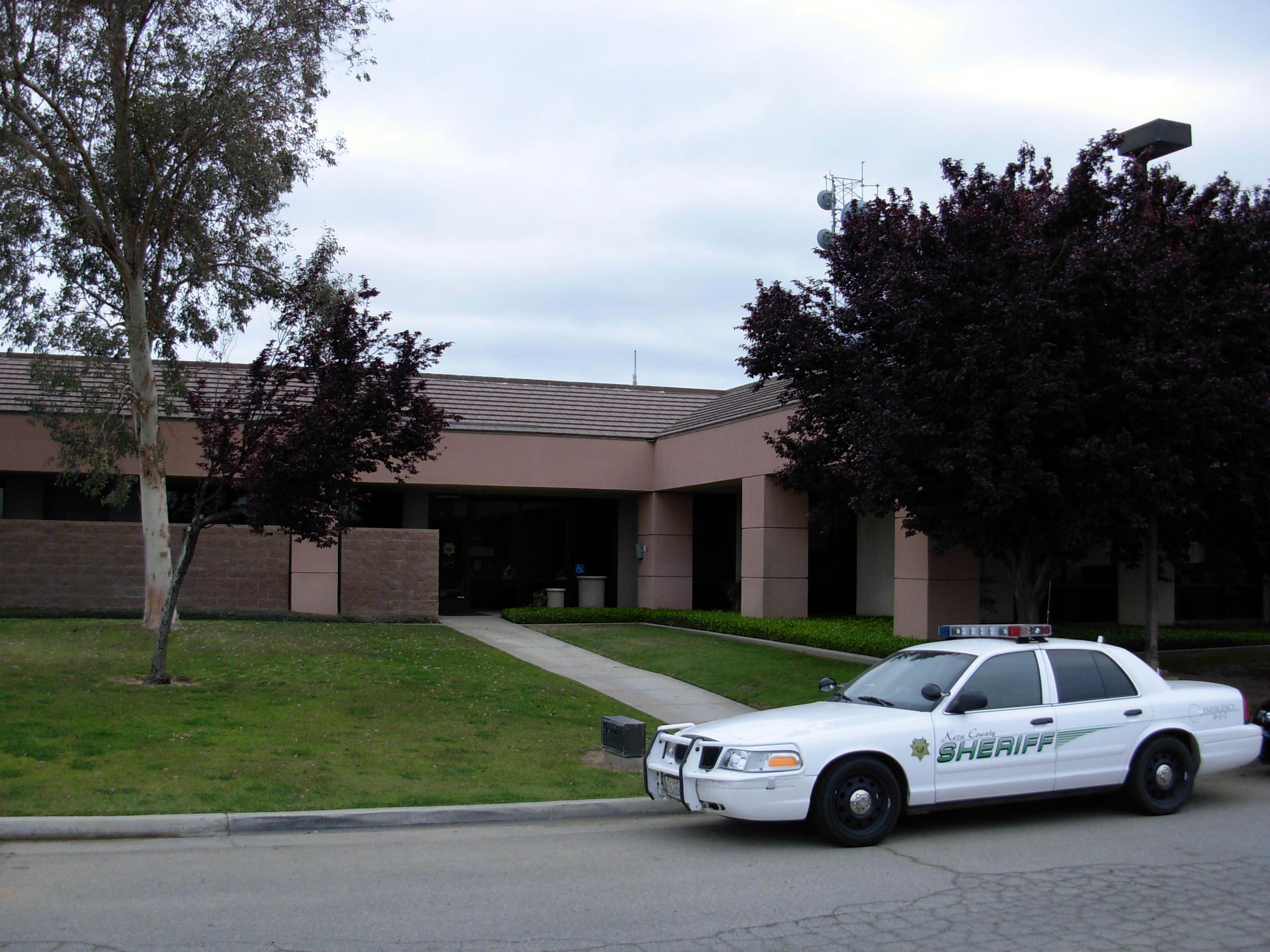 Patrol car parked in front of Lamont substation